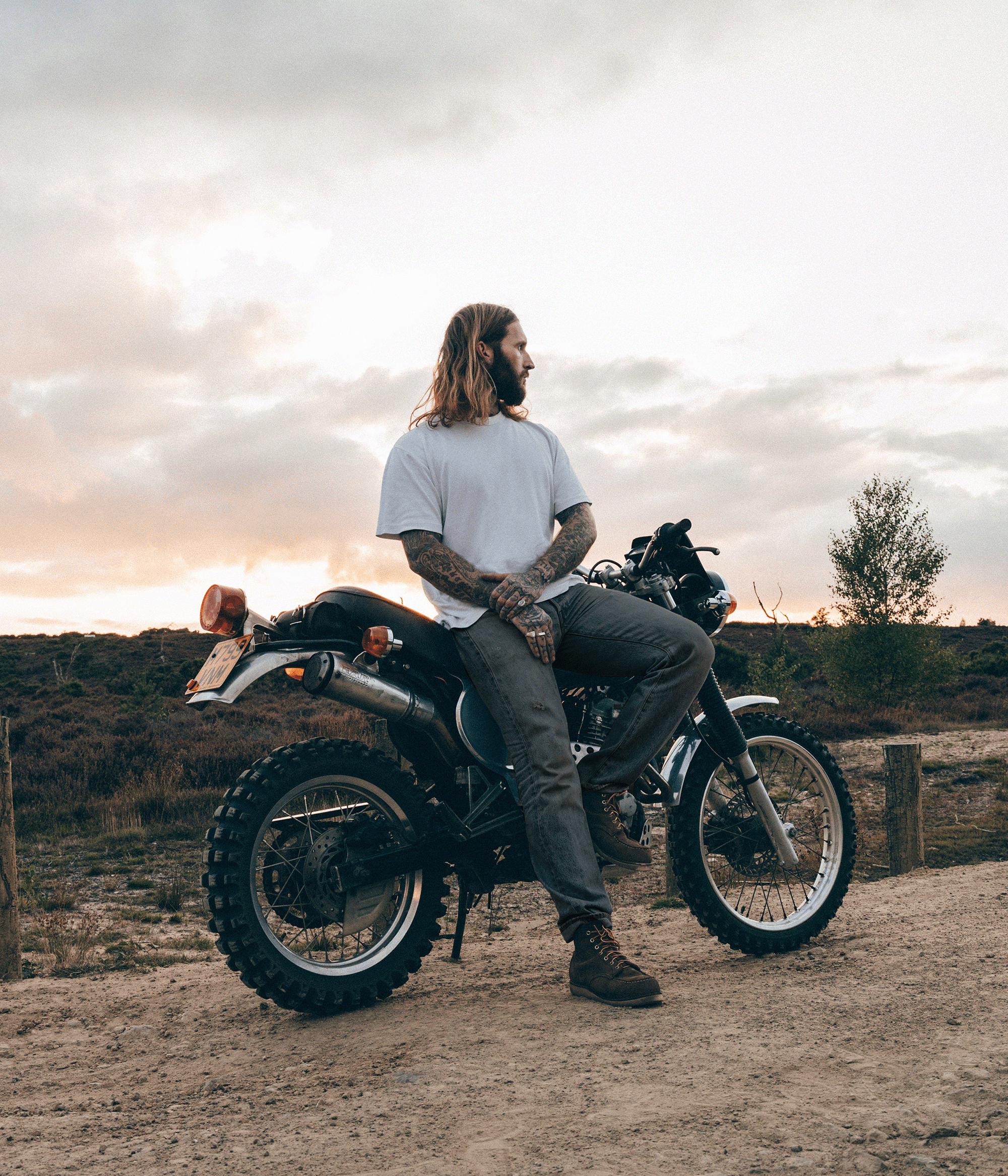 rider sitting on motorcycle